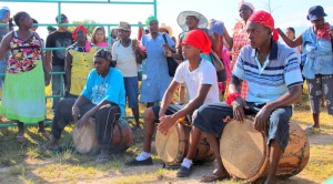 Garifuna youth drum in the direction of Miguel Facusse's African Palm plantation.
