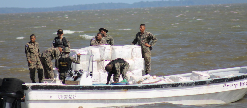 Honduran Coast Guard takes supplies in 2012 to an escalating presence in the village of Ahuuas where US DEA shot at two canoes of villagers in May of 2012. Two pregnant women and adult male, and a child were killed and multiple others were seriously wounded in the attack. The US has never compensated the survivors for their injuries (photo: The Nation Report) 