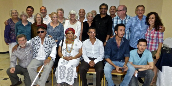 Members of the FARC pose with two Coloradans during Peace Accord Negotiations in 2015 during a delegation led by the Alliance for Global Justice.
